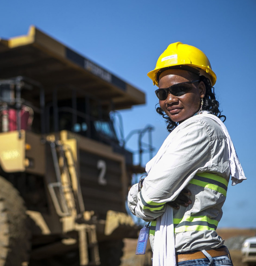 b2gold-fekola-mine-fly-in-fly-out-worker-tractor-at-project