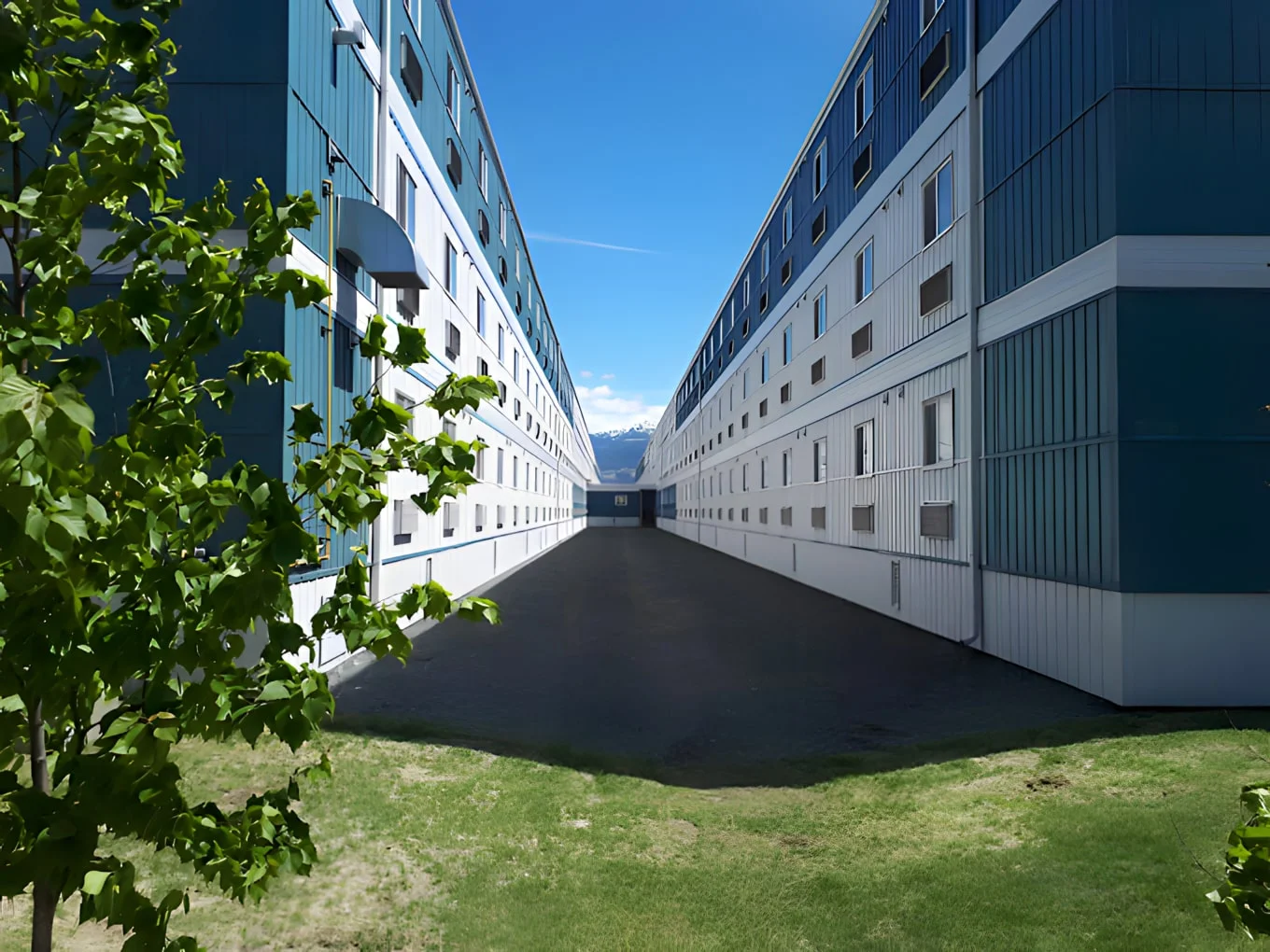 cedar-valley-lodge-dormitories-grassy-patch-springtime