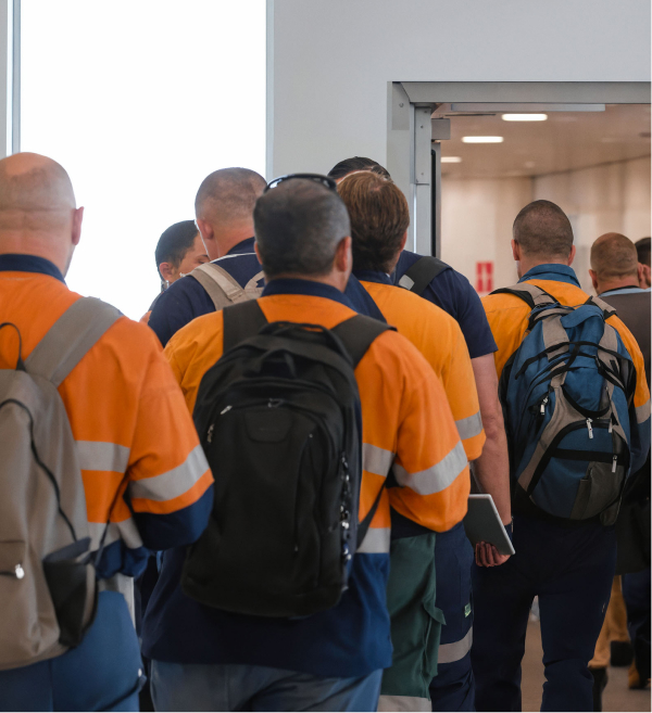 fifo-workers-line-up-board-flight
