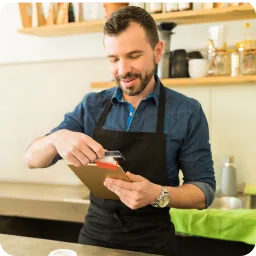 Barista charges credit card cafe