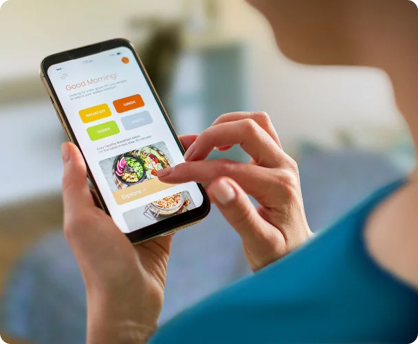 Person reviews daily menu options provided by the camp catering company at a workforce housing facility.